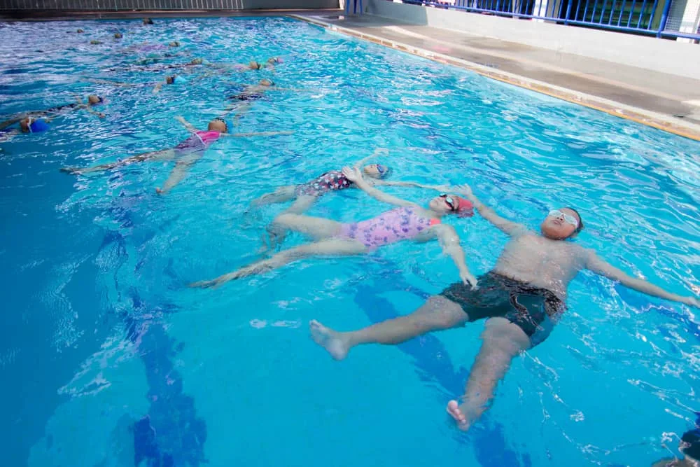 Children swim happily