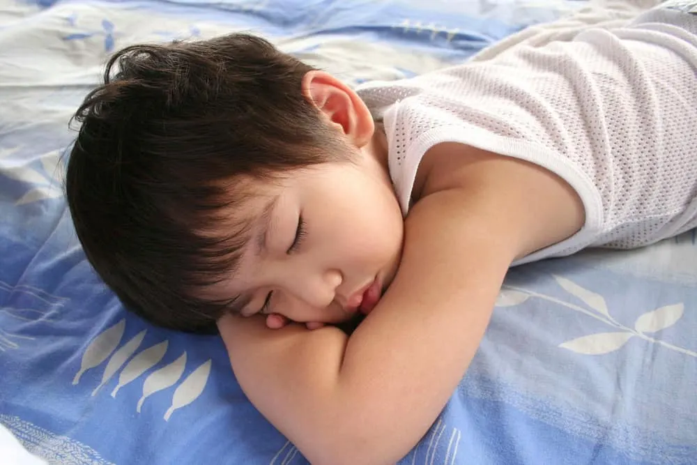 child sleeping swimming